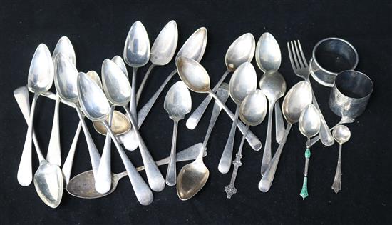 Twenty six items of silver flatware including grapefruit spoons and two silver napkin rings.